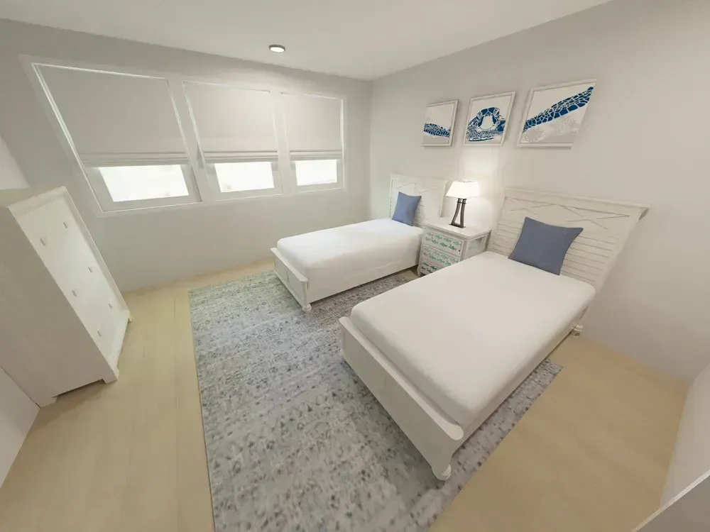 A rendered guest bedroom features two white twin beds with blue accent pillows, a shared nightstand with a lamp, a white dresser, and a gray patterned area rug over light wood flooring, with coastal turtle artwork on the wall above the beds.
